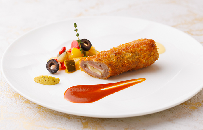 グリュイエールチーズを包んだ仔牛のエスカロップ